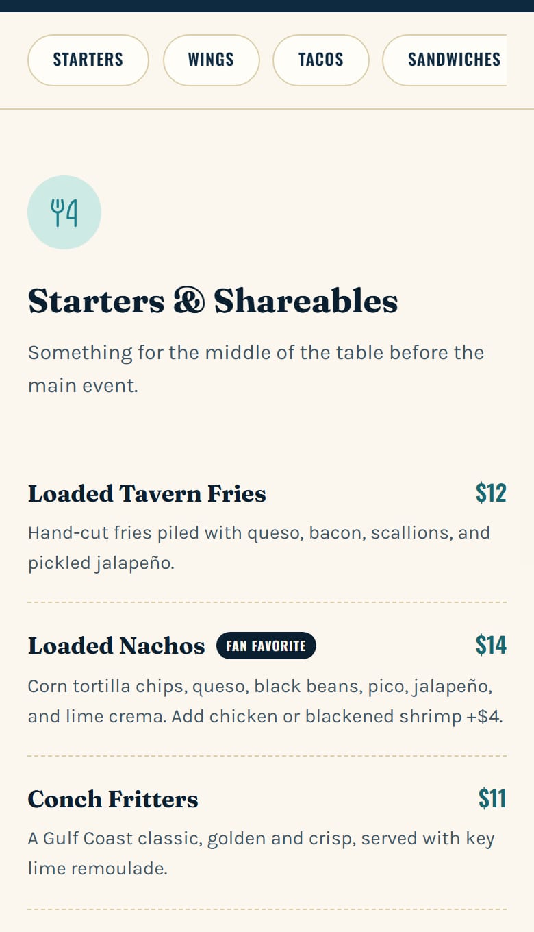 The top of the Menu page on a phone. The row of jump links shows Starters, Wings, Tacos and Sandwiches and scrolls sideways for the rest. Below it, Starters & Shareables opens with Loaded Tavern Fries at $12 and Loaded Nachos at $14 with a Fan Favorite tag.