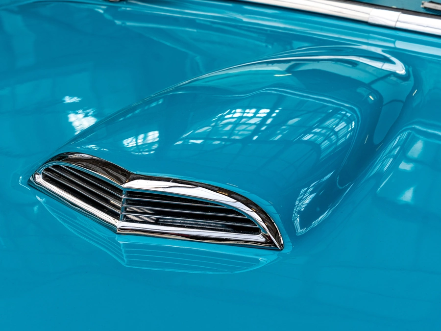 Teal paint and chrome hood scoop, polished